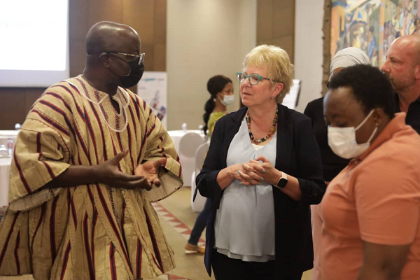 The Executive Director of NSS, Mr Osei Assibey Antwi (left) interacting with the CEO of I am Worth It Project, Ms Tammy Sherger (middle) and Mrs Gifty Oware-Mensah, Deputy Director of NSS.