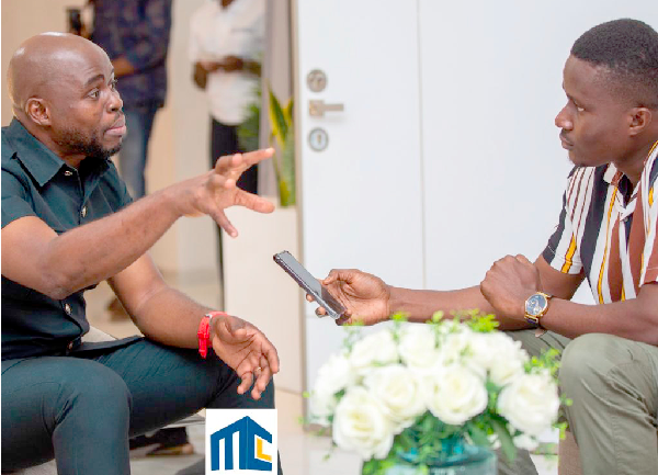  Richard M. Donkor (left), CEO, MCL Ghana, explaining a point to our reporter at the launch