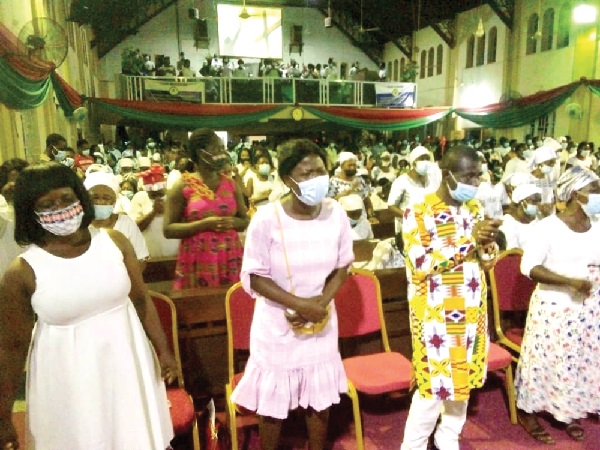 Some worshippers praying for God’s blessings as they welcomed the new year at the Methodist Church