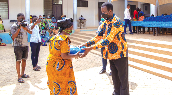 Adutwum supports widows, widowers