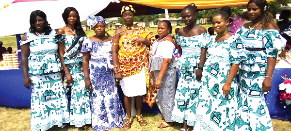  Mrs Mabel Anyomi (4th from right), Chief Executive Officer of May’s Deco and Catering Services, and Mama Gborlenyame (4th from left), Queenmother of the Ameteve Clan at Juapong in the Dorfor Traditional Area, with the graduands after the ceremony