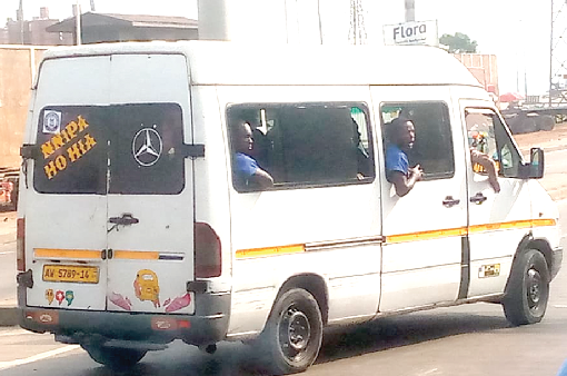 Some prisons immates in a van leaving the Community Three Warehouse premises of CMC