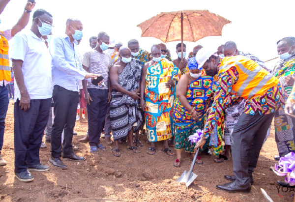 Dr Yaw Osei Adutwum, Education Minister  (with shovel), performing the sod-cutting ceremony for the commencement of work at Sawuah