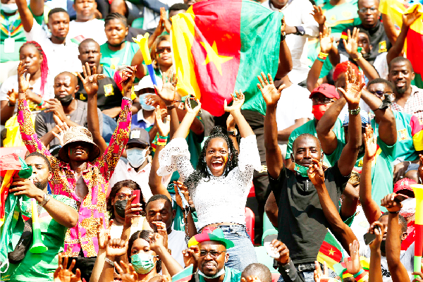Camerounian fans cheering their national team during the opening AFCON match victory against Burkina Faso