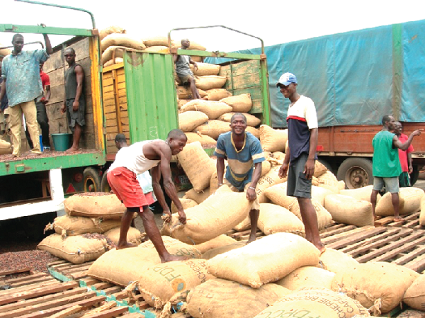 Some cocoa carriers at work
