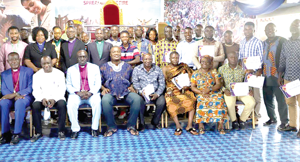 Dr Nana Ayew Afriyie (in smock), MP for Effiduasi-Asokore, Rev. Dr Divine Agyeman Badu (seated 3rd from left) and some dignitaries  with the assembly members after the seminar. Those with them include Mr Osei Adiyiah (seated 2nd from left), the DCE for Sekyere East.
