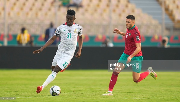 Baba Iddrisu playing for the Black Stars against Morocco