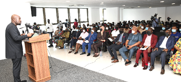 Mr Senyo Hosi (left), Finance and Economic and Policy Analyst, delivering his lecture. Picture: EBOW HANSON