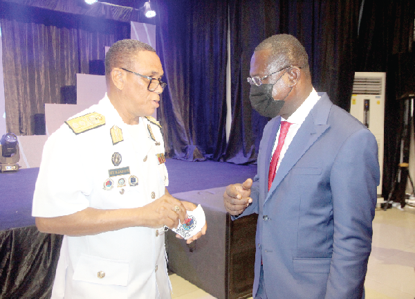 Dr Joseph Siaw Agyepong (right), Executive Chairman of the Jospong Group of Companies, having a discussion with Rear Admiral Moses Beick-Baffour (left), the Commandant of the Ghana Armed Forces Command and Staff College, during the opening ceremony. Picture: ESTHER ADJEI