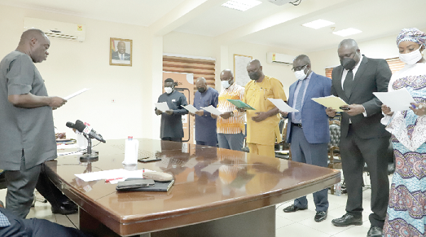 Dr Mohammed Ibrahim Awal (left), the Minister of Tourism, Arts and Culture, inaugurating the Ghana Tourism Development Company Board. Picture: EDNA SALVO-KOTEY