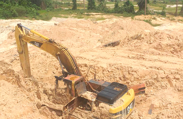  An excavator at one of the mining sites