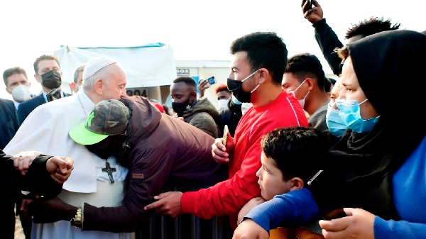 Pope Francis visiting the Mytilene refugee camp on Lesbos, Greece and being mobbed by refugees. Credit: Vatican News