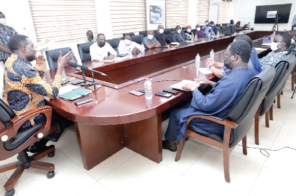 Dr Yaw Osei Adutwum (left), Minister of Education, addressing the NGOs and CSOs in Accra. Picture: SAMUEL TEI ADANO