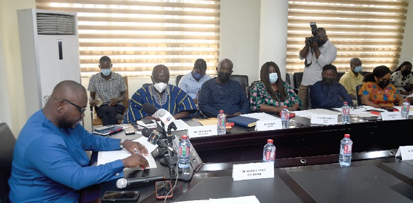 Mr Francis Asenso-Boakye (left), the Minister of Works and Housing, delivering his address at the inuguration of the board of directors for the TDC 