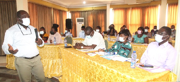 Dr Yaw Amoako (left), Consultant Physician Specialist at Komfo Anokye Teaching Hospital, addressing primary healthcare personnel at the event. Picture: ESTHER ADJEI