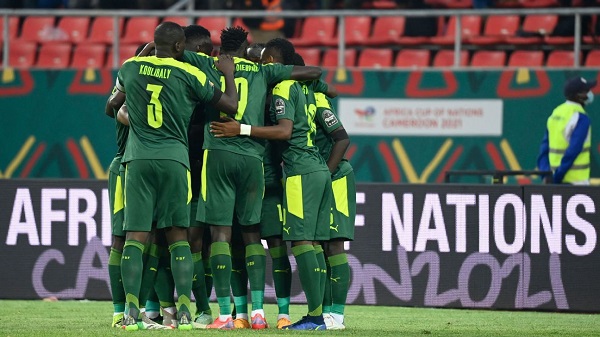Players of Senegal celebrating their way to the quarter -finals
