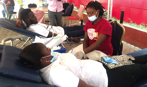 Some donors giving blood at the Tema branch of Melcom Plus during the campaign. Picture: BENJAMIN XORNAM GLOVER