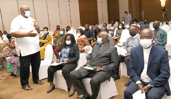 Mr Henry Quartey (standing), the Greater Accra Regional Minister, interacting with some members of the clergy. Picture: EBOW HANSON
