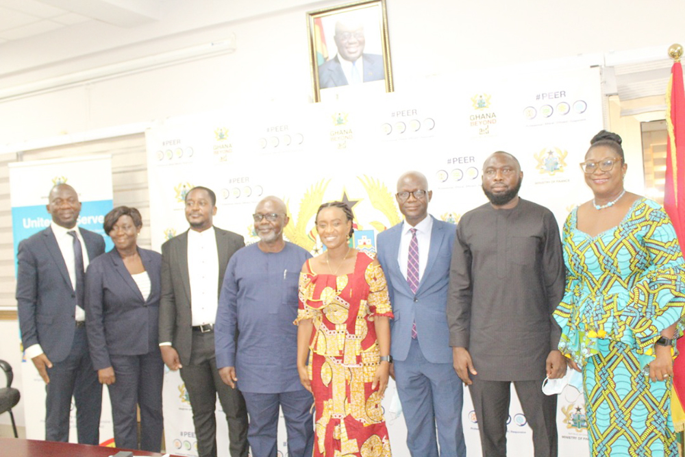 Mrs Abena Osei-Asare (4th from right), a Deputy Minister of Finance, with members of the newly inaugurated board