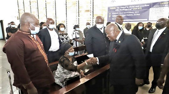 President Akufo-Addo consoling Mrs Comfort Agyapong (seated), surviving wife of the late Justice Kwadwo Adjei Agyapong, at the Remembrance Service in Accra. With them is Vice-President Dr Mahamudu Bawumia (right). Picture: SAMUEL TEI ADANO