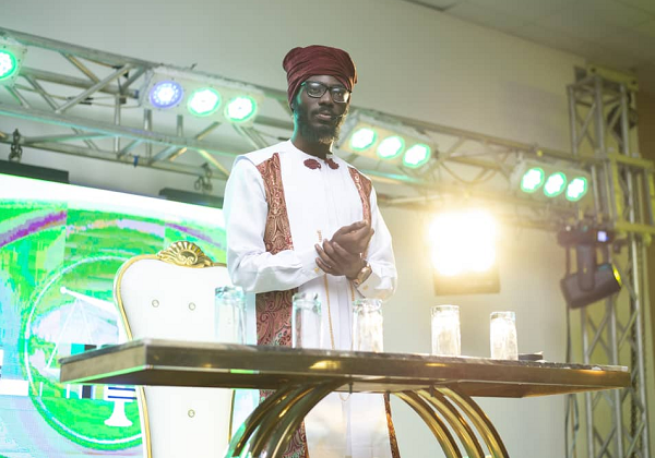 Ahokagya speaking at the spiritual event in Accra