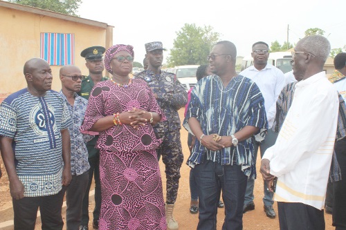 Justina Owusu-Banahene (2nd from left), Bono Regional Minister, interacting with Alexander Obour Damoah (2nd from right), the Wenchi MCE, and Alhaji Abdallah Ahmed-Abdallah (right), the Chief Executive Officer of PMC Africa Limited, during the inspection of the seven-kilometre Wenchi town road project.