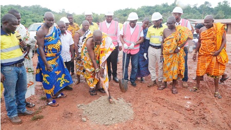 Nana Kojo Appiah, the Chief of Ayanfuri, performing the sod-cutting ceremony for the projects