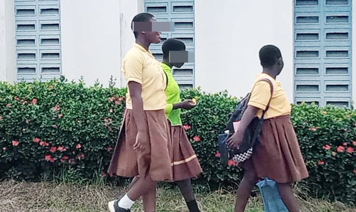Some schoolchildren in Koforidua on their way home 