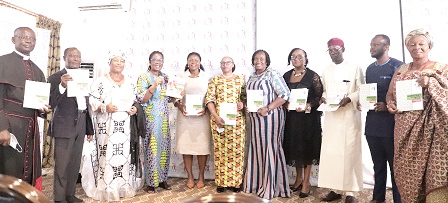 Dr Rose Mensah-Kutin (4th from left), Executive Director, ABANTU for Development; Kathleen Addy (5th from left), Chairperson, National Commission for Civic Education; Angela Lusigi (6th from right), UNDP Resident Representative, and other dignitaries launching the NCCE Gender Policy.  Picture: EDNA SALVO-KOTEY