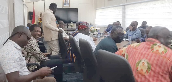 Ignatius Baffour-Awuah (standing) interacting with participants at the meeting between the government and striking teacher unions/TUC yesterday