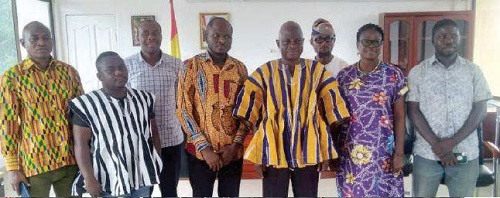 Stephen Yakubu (3rd from right), Upper East Regional Minister, with the new Upper East Regional executives of the GJA