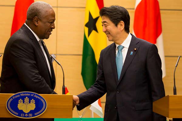 Former President John Dramani Mahama (left) with the late former Prime Minister of Japan, Shinzo Abe. 