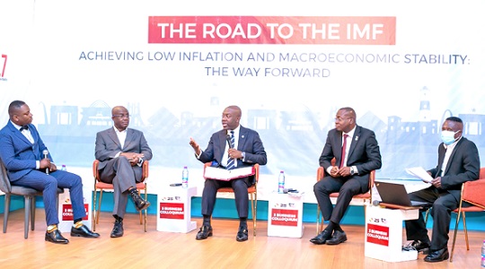 Kojo Oppong Nkrumah (middle), Minister of Information,  making a comment during the colloquium