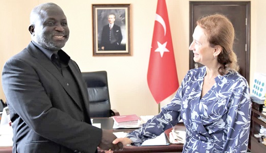 Samuel Nii Adjei Tawiah (left), Municipal Chief Executive of Korle Klottey Municipal Assembly, and Ozlem Ergun Ulueren (right), Turkish Ambassador to Ghana, exchanging pleasantries after the meeting.