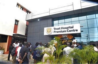   Kofi Bosompem Osafo-Maafo (right), Deputy Director-General in charge of Investment &amp; Development, Social Security and National Insurance Trust, unveiling a plaque to officially open the Trust Hospital Premium Centre in Accra, while Dr Juliana Oyeh Ameh, CEO of the Trust Hospital, and Dr Emmanuel Otopa Addo-Yobo — Board Chairman, look on. 