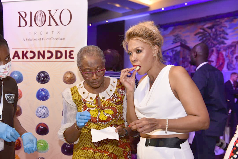 Grace Jeanet Mason (right), the South African High Commissioner to Ghana tasting a made-in-Ghana product at the event