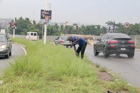  A median area in Accra being cleared