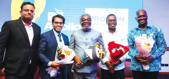 Dr Anthony Nsiah-Asare (middle), Presidential Advisor on Health, with the management of the Apollo Proton Cancer Centre
