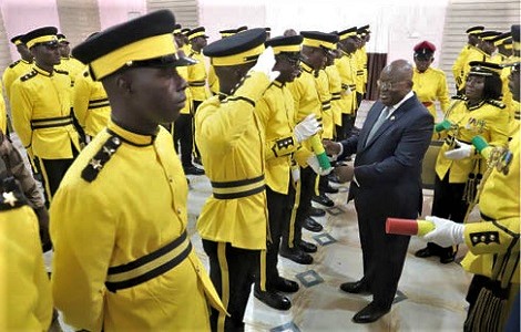 President Akufo-Addo presenting the instrument of office to Cadet Course Intake 29 graduates at a ceremony in Accra. Picture: SAMUEL TEI ADANO