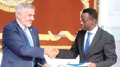 Kwabena Okyere Darko-Mensah (right), Western Regional Minister, exchanging one of the three agreements with Lluis Serra Majem, Rector of the University of Las Palmas