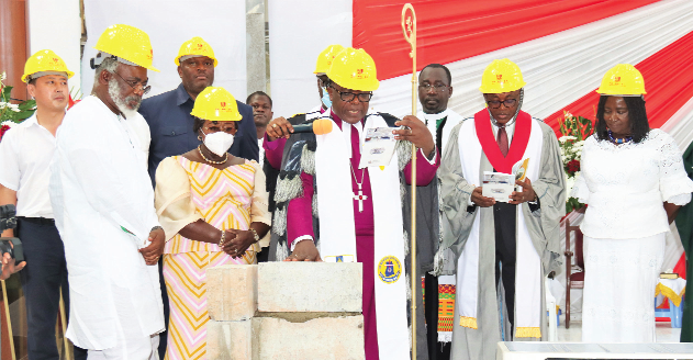 The Most Rev. Dr Paul Kwabena Boafo (middle), Presiding Bishop, Methodist Church of Ghana, laying the foundation stone for the new Calvary Methodist Church building at Adabraka. Looking on are Akosua Frema Osei-Opare (2nd from left), Chief of Staff at the Office of the President; Albert Essamuah (left), architect of the building, and some dignitaries at the event. Picture: ELVIS NII NOI DOWUONA