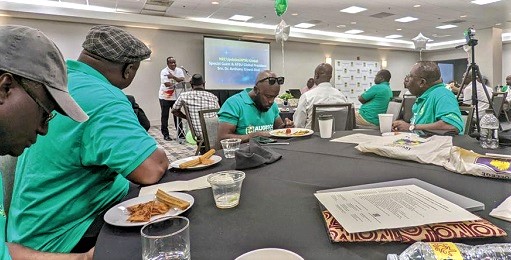   Dr Tony Osei (arrowed), APSU Global President, addressing members