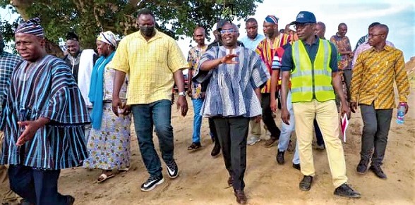 Dr Mahamudu Bawumia (arrowed) being conducted round the project