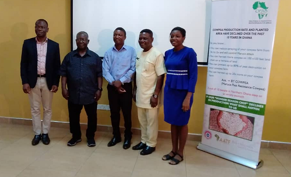 Professor Hans Adu-Dapaah (2nd right) in a group photo with some participants at the stakeholder meeting on GM technology