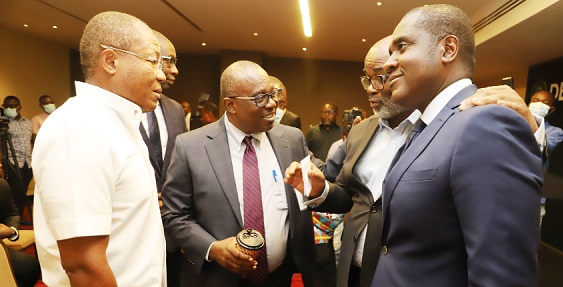 Kwamina Duker (left), the CEO of the Development Bank Ghana, interacting with Kwabena Opuni Frimpong (2nd from left), the Chief Economist of the DBG; Michael Mensah Baah (right), the Deputy CEO of the DBG, and Nii Okai Nunoo (2nd from right), the CEO of Leonant-Yert, after yesterday’s news conference in Accra. Picture: GABRIEL AHIABOR