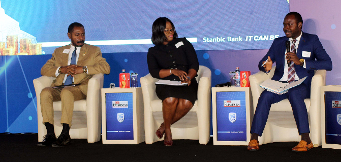  Dr Adu Owusu Sarkordie (right), Economics Lecturer, University of Ghana, making some remarks during the panel discussion at the Graphic Business/Stanbic Bank Breakfast meeting. With him are Florence Hope-Wudu (middle), Managing Consultant, Purple Almond Consulting Services, and Nana Osei Bonsu, Private Enterprise Federation. Picture: Maxwell Ocloo