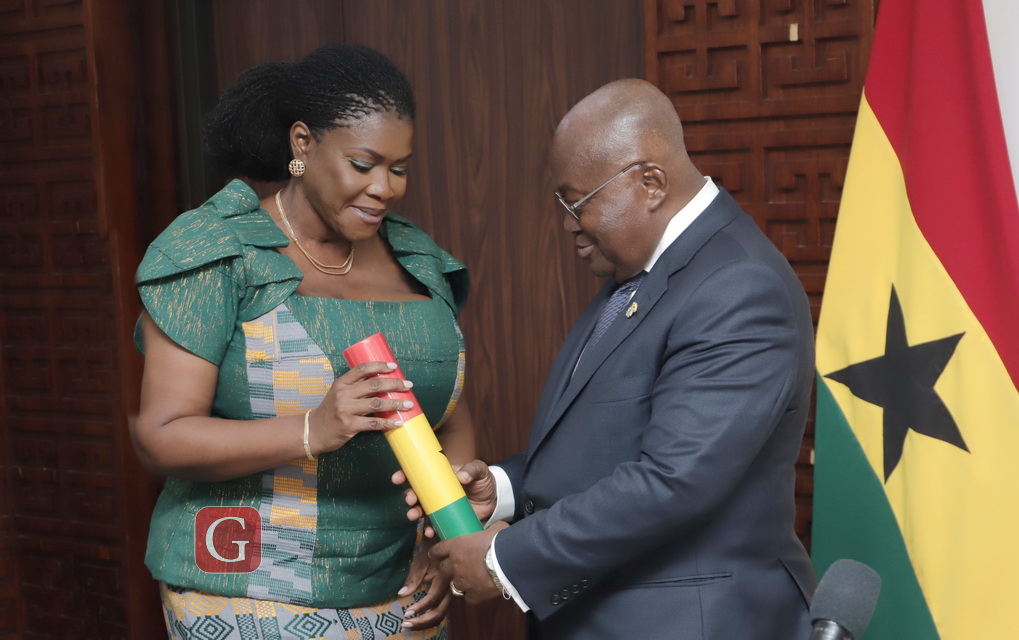 President Akufo-Addo hands Ms. Kathleen Addy, new Chairperson of NCCE, her credentials 