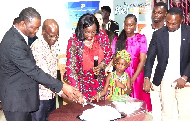Sheila Naah-Boamah (middle), Technical Advisor, Ministry of Education, being assisted by Prof. Clement Kwaku Dzidonu (2nd from left), President, Accra Institution of Technology, and other dignitaries to launch Eduaction101-Africa. Picture: ELVIS NII NOI DOWUONA