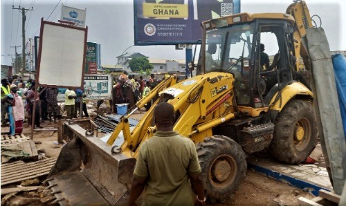 A bulldozer at work at Manet Junction during the demolition exercise