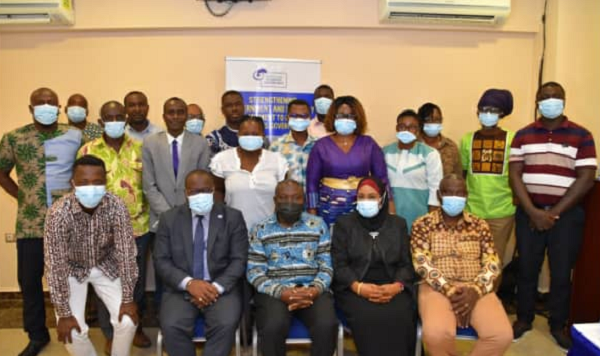 The media participants at the training workshop with officils of Hen Mpoano, FCWC and the Deputy Minister of Fisheries and Aquaculture Development (seated middle in first roll), Mr Moses Anim.  